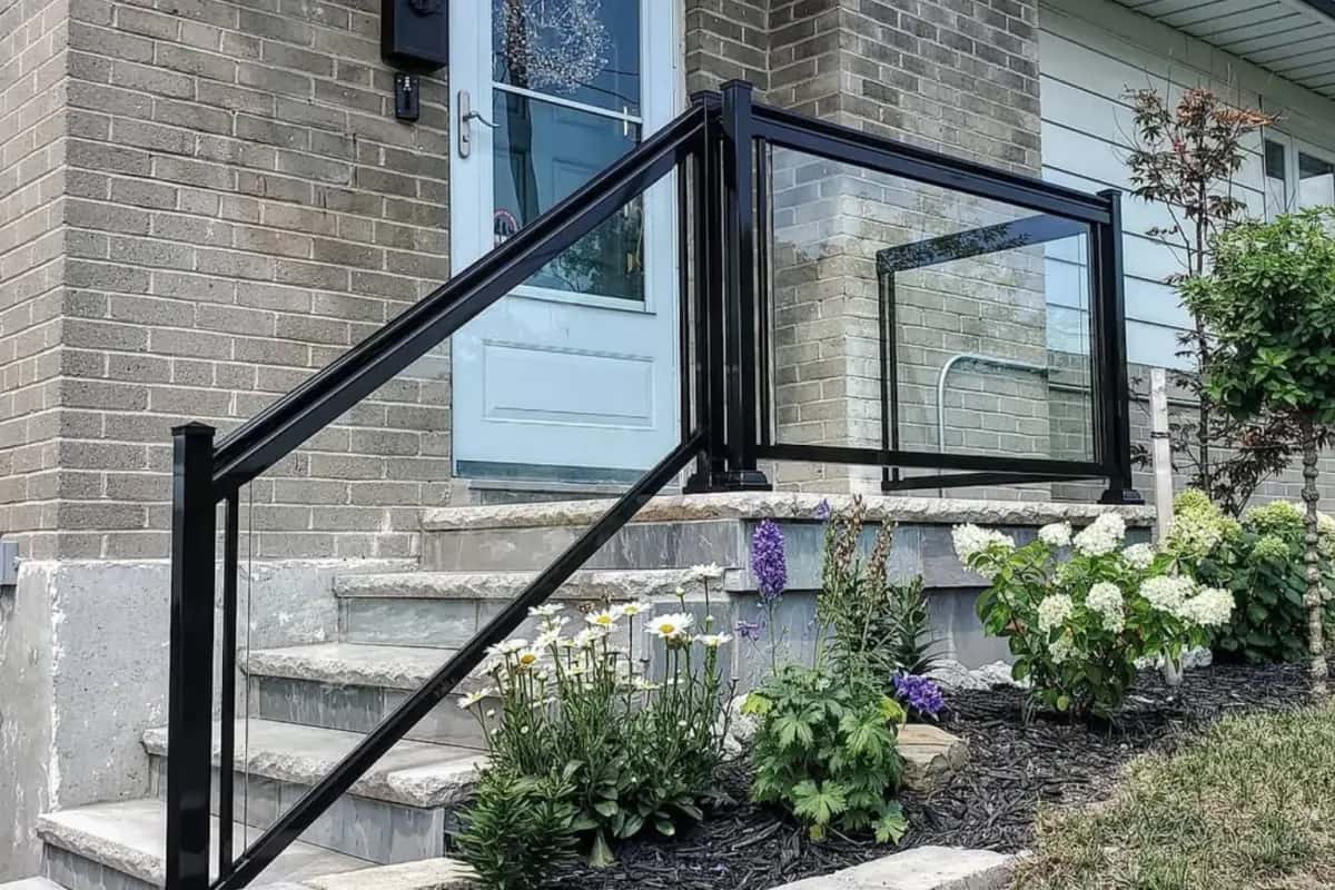 Black aluminum framed clear glass railing in Richmond Hill