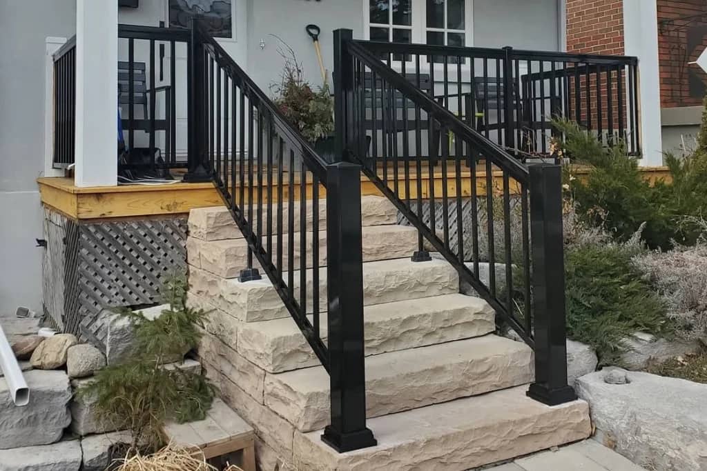 Black aluminum picket porch railing on the Danforth, Toronto